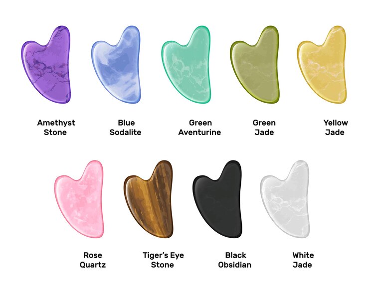 Vettore gratuito gua sha strumenti di massaggio fatti di quarzo rosa giada ossidiana blu sodalite verde avventurina ametista occhio di tigre pietra composizione realistica illustrazione vettoriale isolata