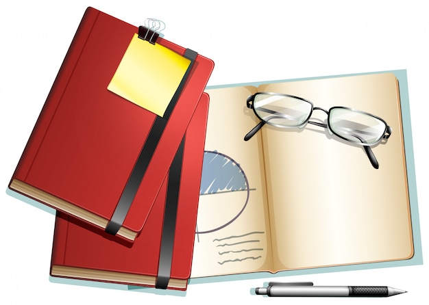 Libri e occhiali su di esso