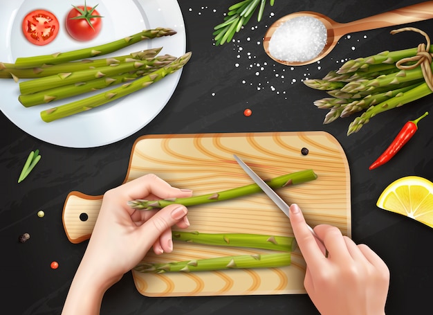 mani realistiche che tagliano gli asparagi