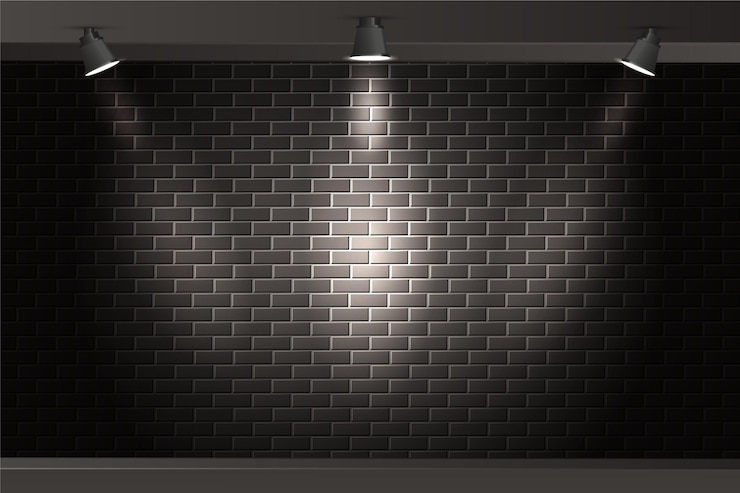 Vettore gratuito muro di mattoni con sfondo illuminato