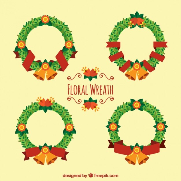 Quattro corone di fiori con campane decorativi e nastro