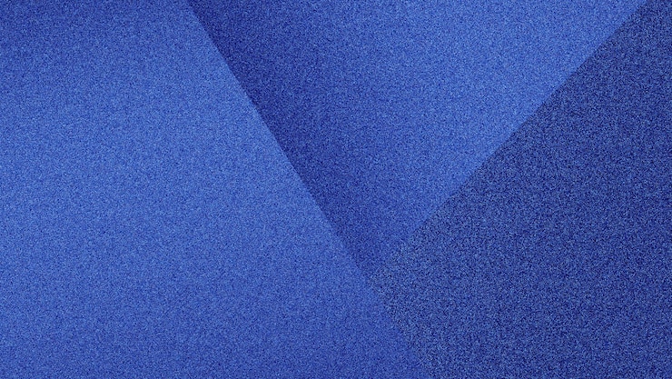 Vettore gratuito sfondo astratto con consistenza granulosa colore blu