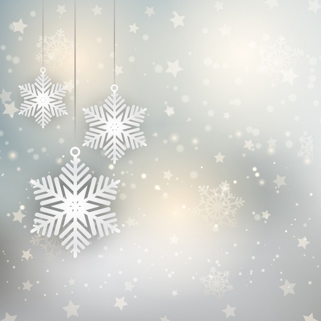 sfondo decorativo di Natale con i fiocchi di neve appesi