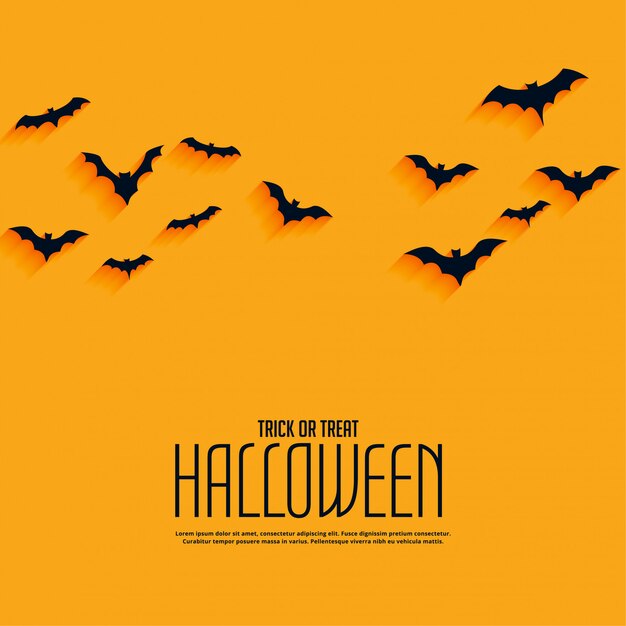 Sfondo giallo felice halloween con pipistrelli volanti