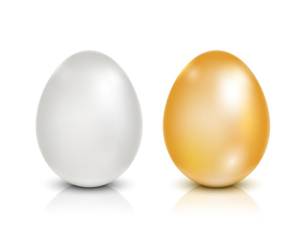 Uova dorate e bianche isolate