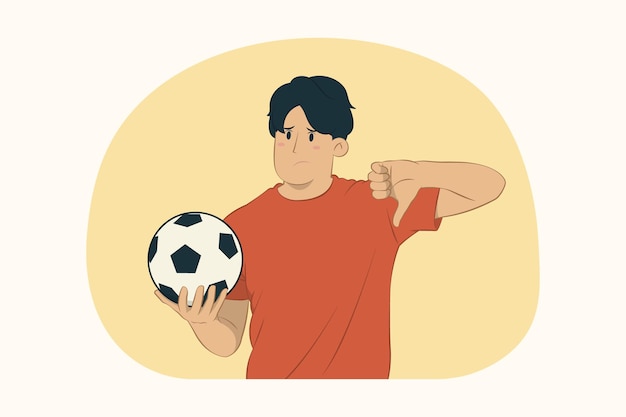 Appassionato di calcio del giovane che mostra il pollice verso il basso
