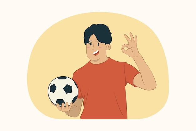 Appassionato di calcio del giovane che mostra segno GIUSTO