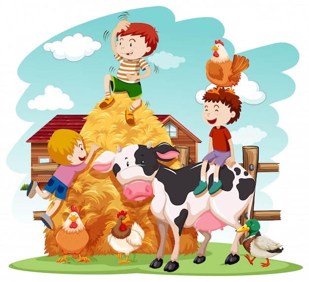 Bambini che giocano con animali da fattoria in campo