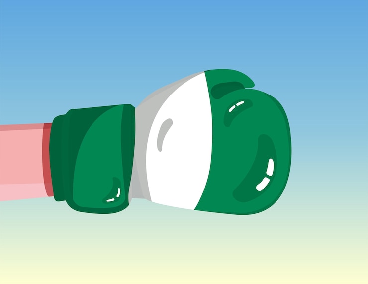 Vettore bandiera della nigeria sul guantone da boxe confronto tra paesi con potere competitivo