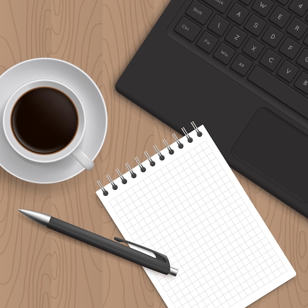 Blocco vuoto di carta penna e caffè