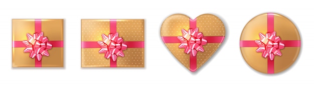 Confezione regalo dorata con fiocco rosa