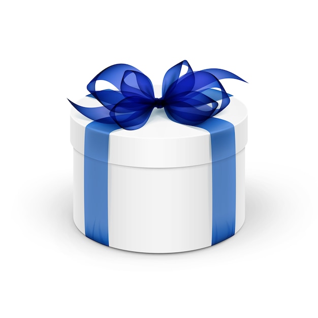 Contenitore di regalo rotondo bianco con il nastro blu e l'arco isolati su fondo
