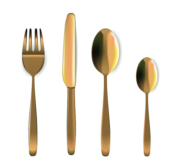 Cucchiaio, forchetta e coltello realistici dell'oro sul tavolo da pranzo per alimento