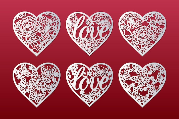Cuori tagliati al laser con motivi di peonie, farfalle, fiori e parola amore, design di carte di San Valentino.