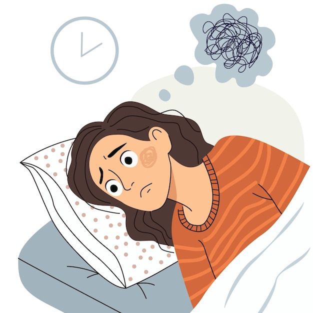 Donna insonne sdraiata ansiosa a letto a tarda notte che mostra inquietudine e insonnia