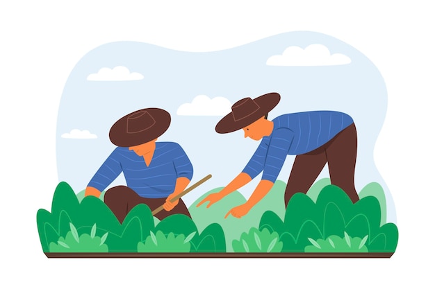 Due agricoltori che piantano piante in giardino