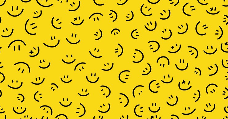 Vettore facce sorridenti su un disegno giallo senza cuciture disegnato a mano in vari modelli caotici