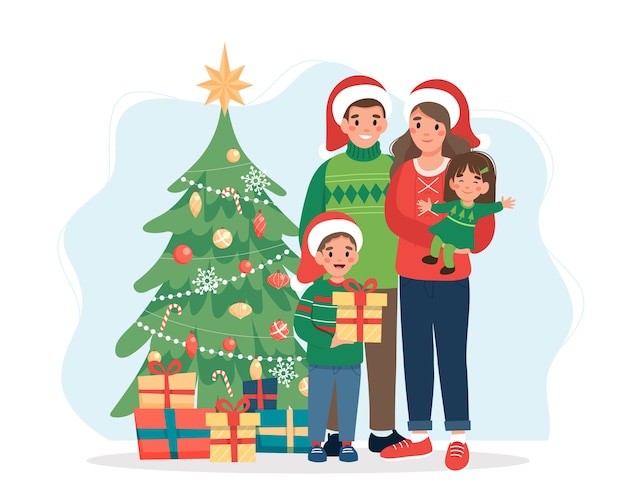 Famiglia felice con l'albero di Natale