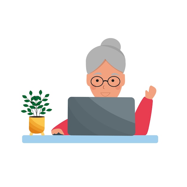 Felice donna anziana, anziana, pensionata, nonna con un computer portatile sorride e agita la mano.