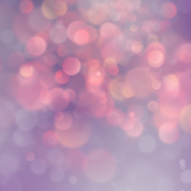 Vettore il bello scintillio magico rosa ed arancio accende il fondo del bokeh