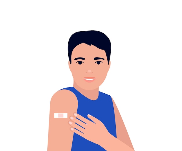 il giovane dopo la vaccinazione mostra il braccio con la mano cerotta con la benda dopo aver ricevuto l'inoculazione