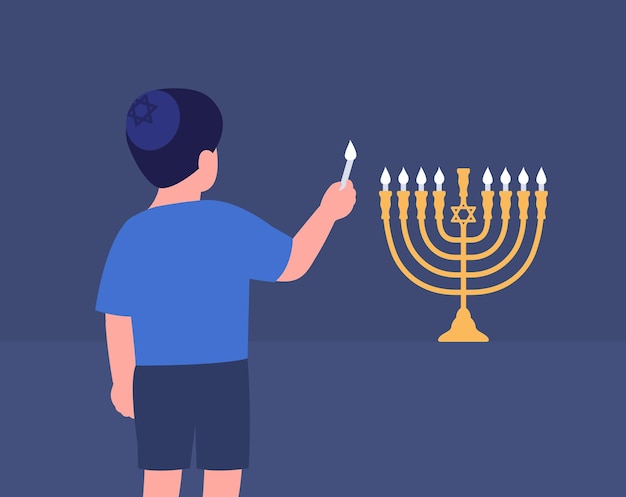 Il giovane ragazzo accende la menorah