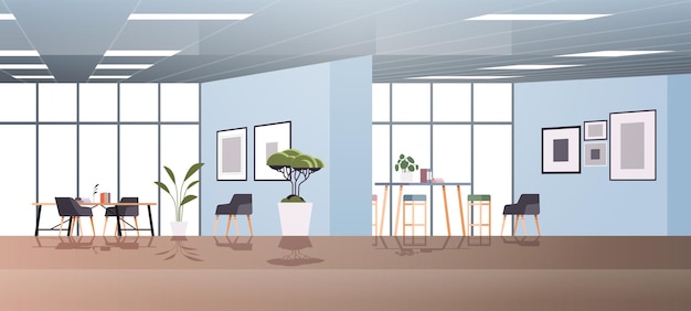 Il moderno gabinetto del posto di lavoro creativo è vuoto e non c'è un centro di co-working contemporaneo per interni dell'ufficio delle persone
