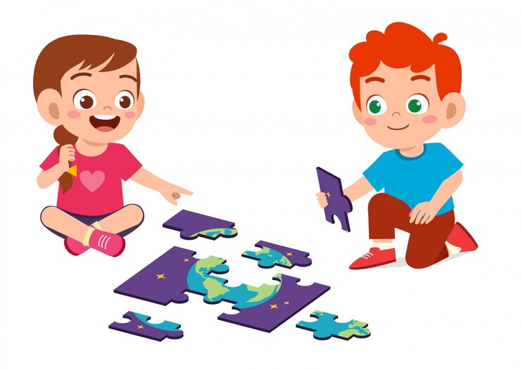 Il ragazzo e la ragazza svegli felici del bambino giocano il puzzle