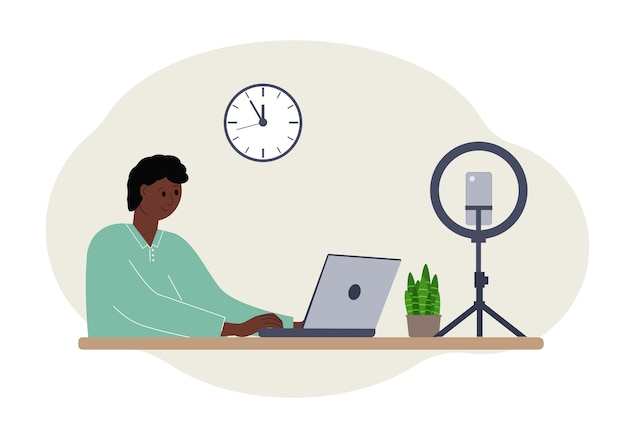 Illustrazione vettoriale di un blogger maschio al tavolo con un computer portatile. Riprese online di un corso di formazione o di un blog