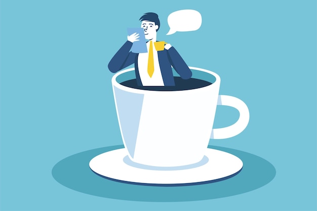 L'uomo d'affari si rilassa dal duro lavoro sorseggiando un caffè