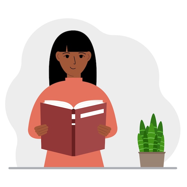 La donna ha in mano un grosso libro