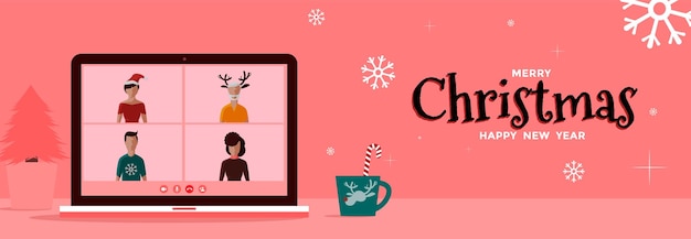 La festa di natale online con videochiamata su quattro persone celebra la videochat delle vacanze sul concetto di laptop