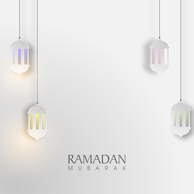 Lampade di carta sospese luminose decorate su sfondo grigio per il mese santo islamico Ramadan Mubarak