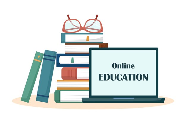 Laptop con libri e occhiali