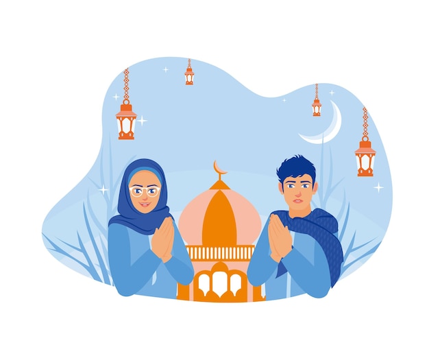 Le giovani coppie si perdonano e si augurano l'un l'altro un felice Eid Happy Eid Mubarak concetto.
