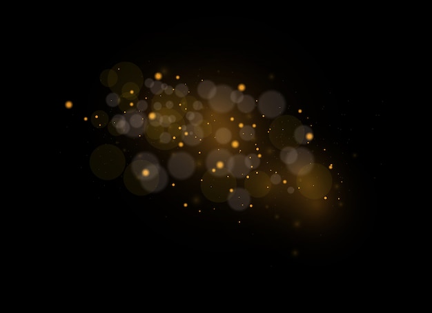 Le scintille di polvere e le stelle dorate brillano di luce speciale. Particelle di polvere magica scintillante.