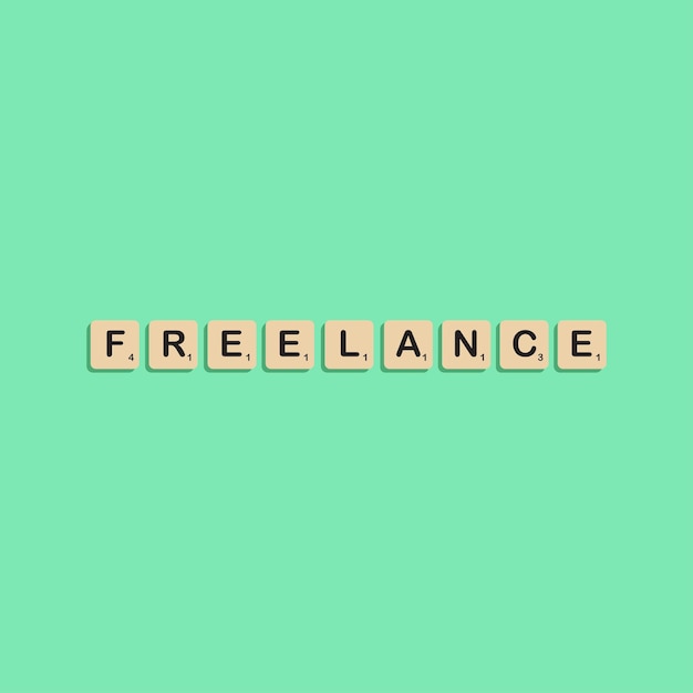 Lettere tipografiche freelance in scrabbles block alfabeto concept