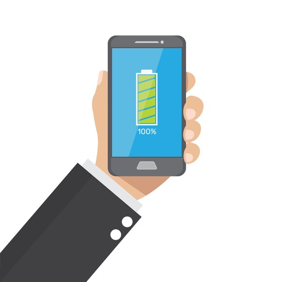 Mano che tiene la batteria piena di smartphone.