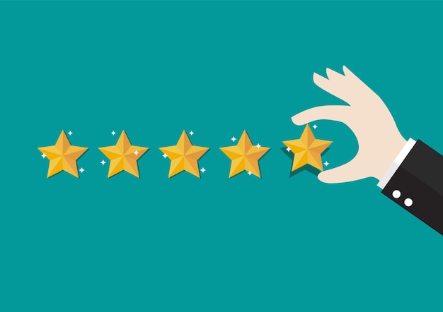 Mano dell'uomo d'affari che dà valutazione a cinque stelle. Feedback con valutazione di soddisfazione.