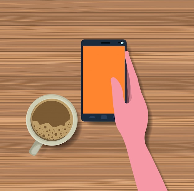 mano utilizzando smartphone con tazza di caffè in tavola