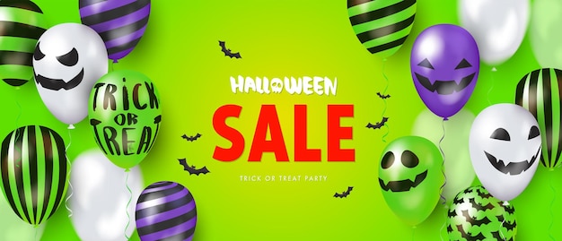 Modello banner sfondo verde con palloncini 3d con facce Happy Halloween