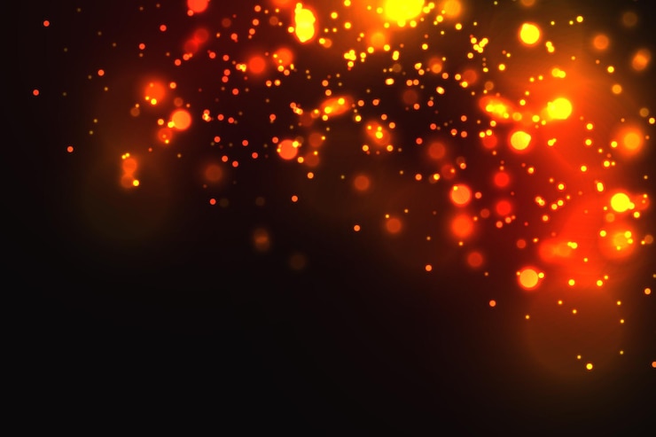 Vettore particelle dorate cerchi gialli luminosi del bokeh