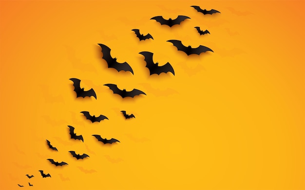 pipistrelli di Halloween che volano su sfondo arancione