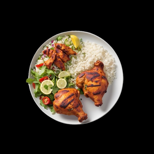 Pollo al limone e insalata con riso alle erbe su un piatto