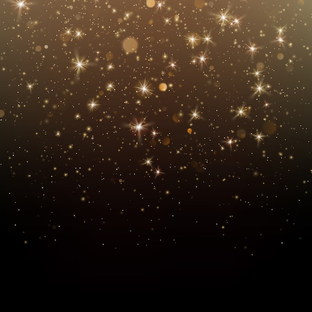 Polvere di stelle scintillanti d'oro scintillanti particelle su sfondo scuro.