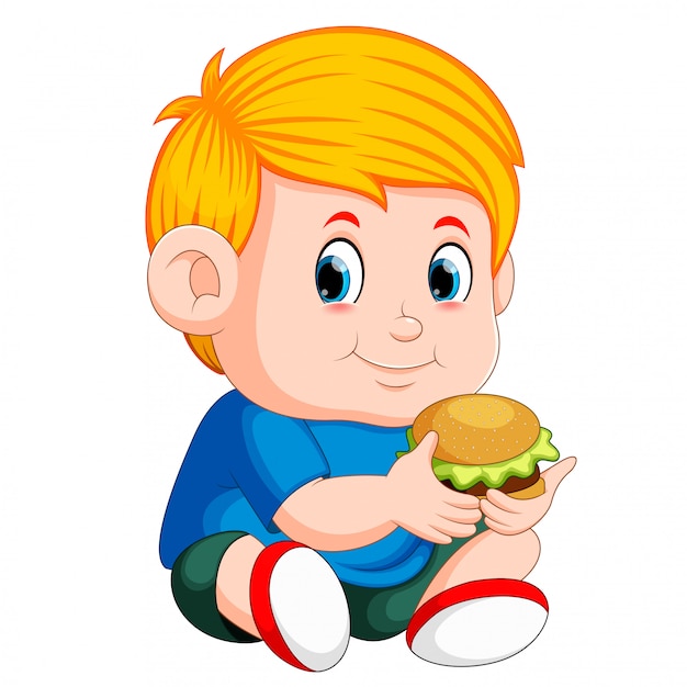 ragazzo che mangia hamburger