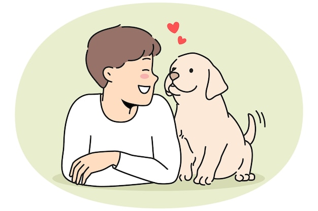 Ragazzo sorridente con un cucciolo carino
