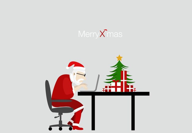 Santa lavora con il portatile