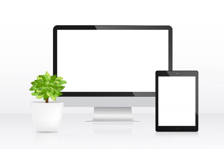 Vettore schermo e tablet sulla scrivania con vaso di fiori.