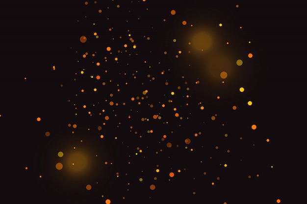 Scintille d'oro e stelle dorate brillano con un effetto speciale.